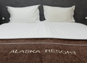 comfortable bed in hotel room