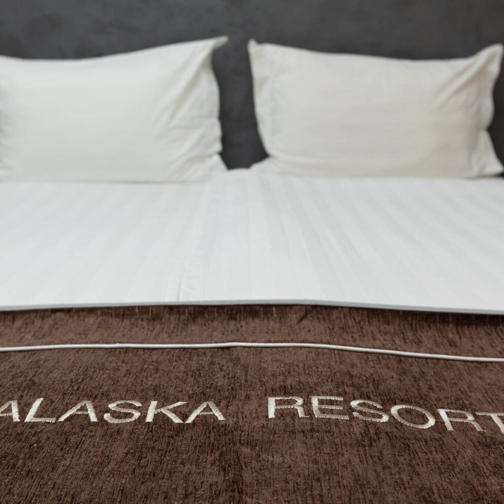 comfortable bed in hotel room