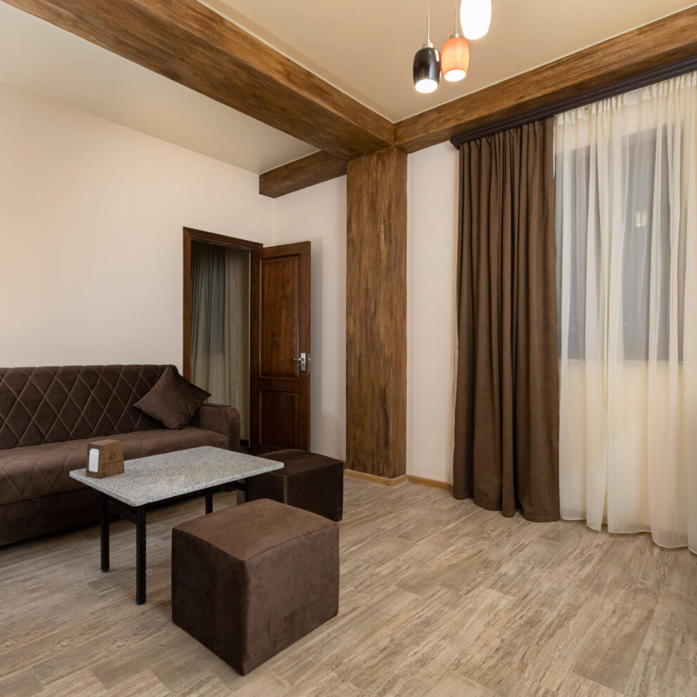 sitting area in deluxe room - Alaska Resort