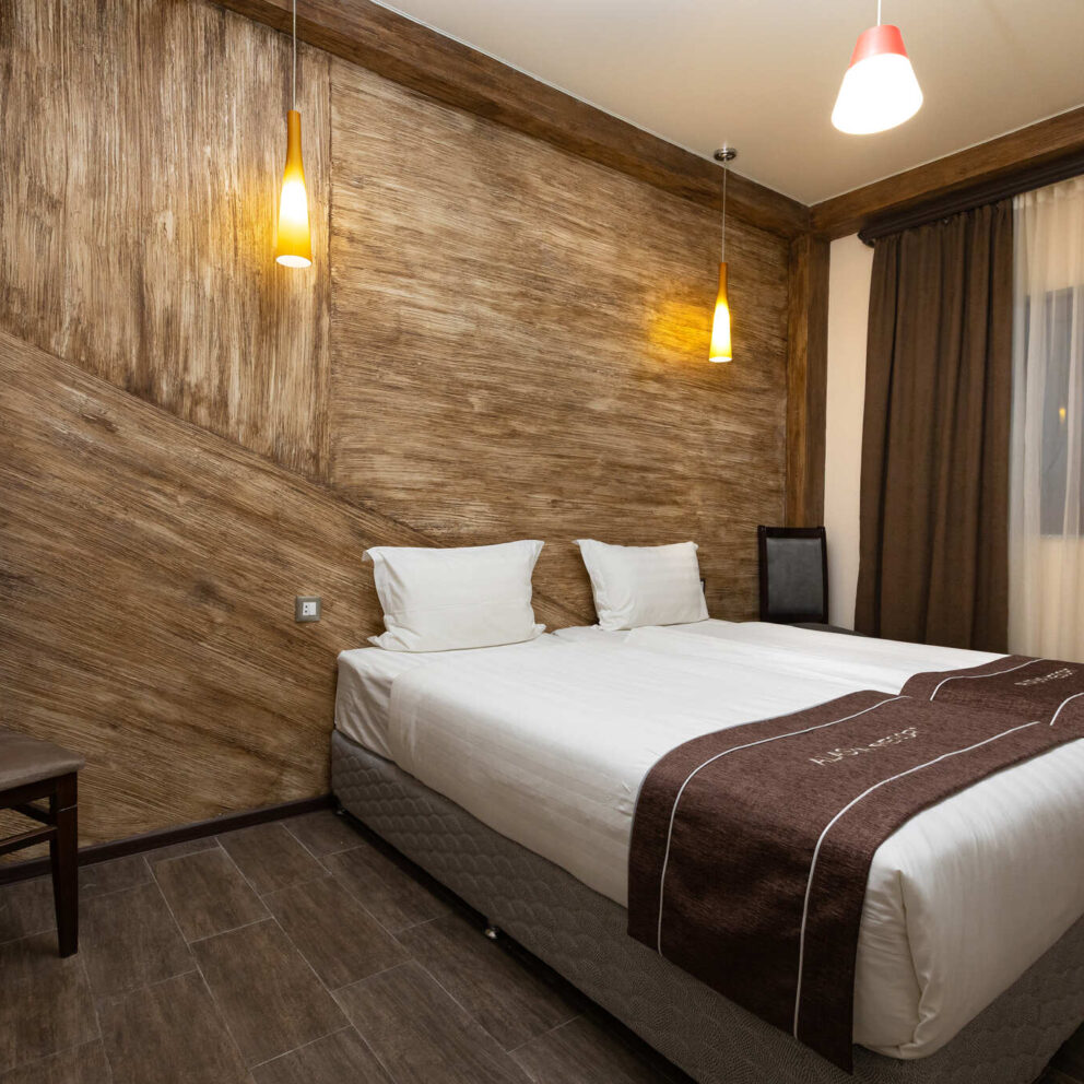 bedroom of deluxe room
